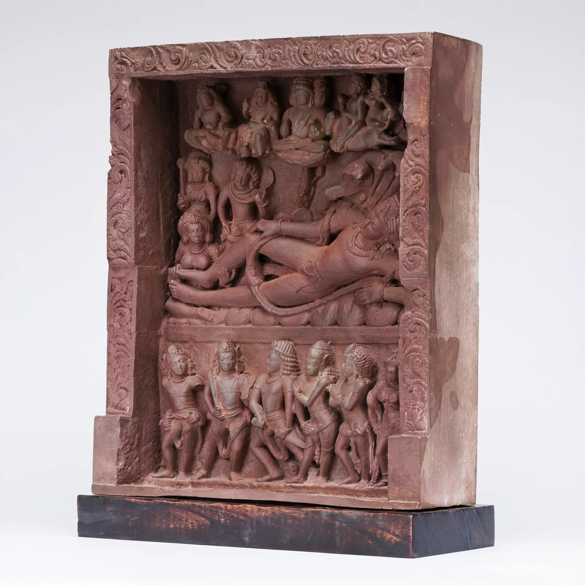 A detailed terracotta-style Anantasayana Vishnu Sculpture showing the deity reclining on a serpent within an ornate temple niche.