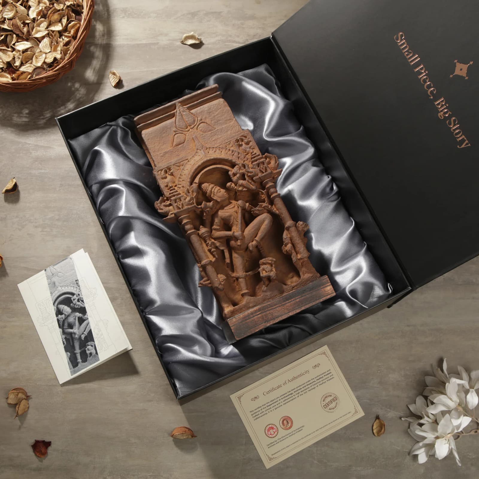 The Gajasura Vadha Sculpture replica rests in a satin-lined gift box, featuring intricate stone composite detailing and an authenticity certificate.
