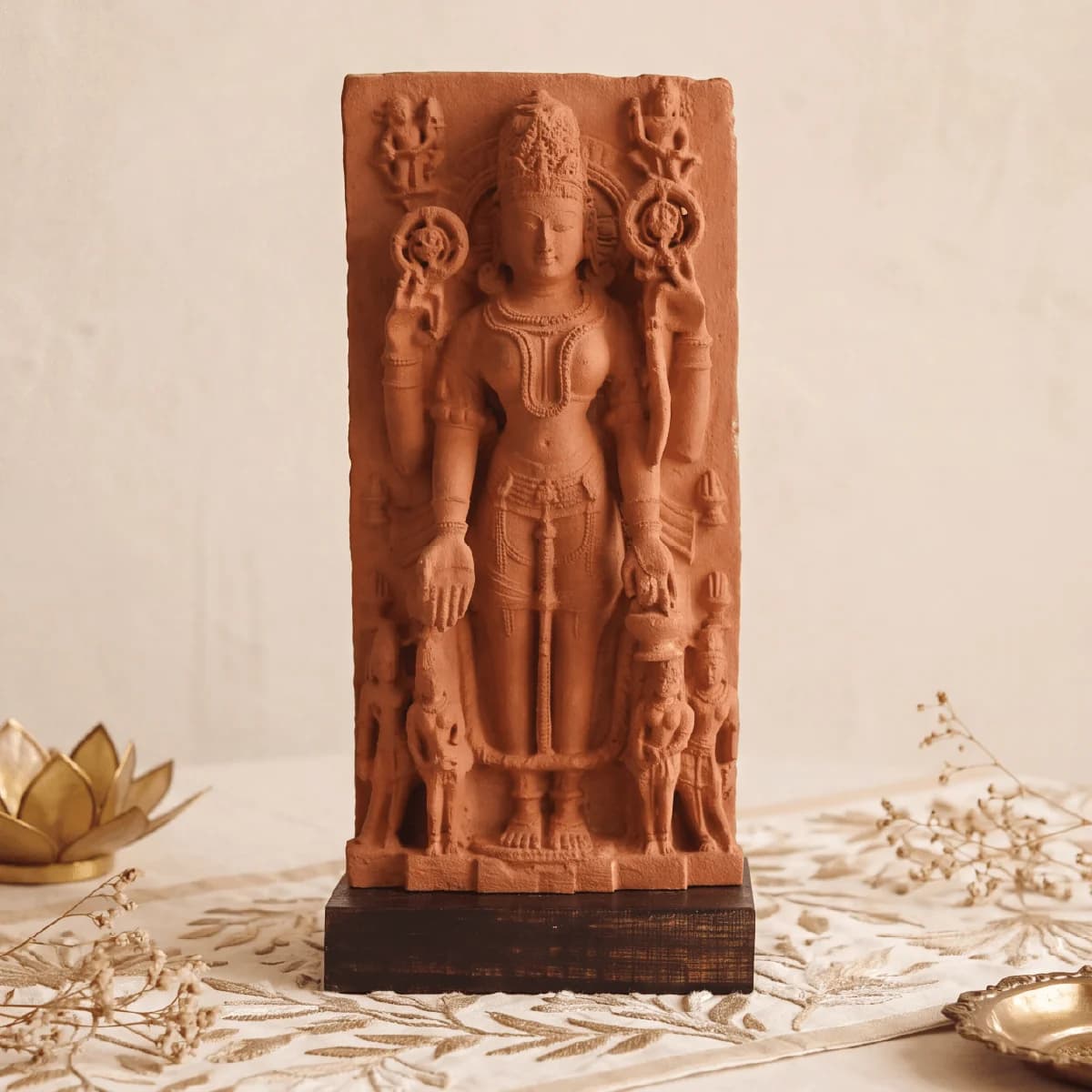 A front view of the Gauri Parvati Sculpture, a hand-finished stone composite replica featuring intricate temple art carvings.
