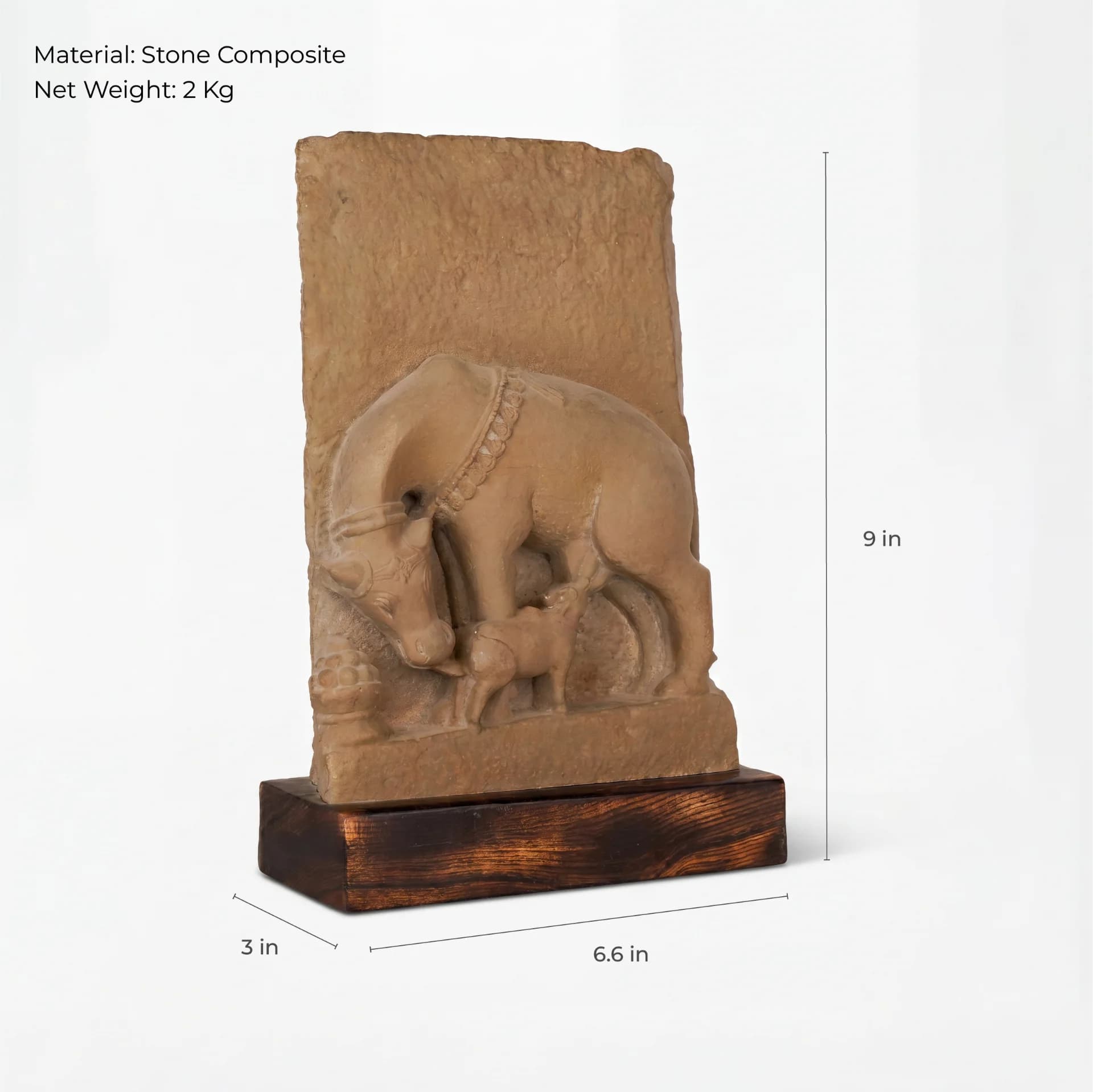 A three-quarter view of the Kamdhenu Sculpture, a stone composite museum replica showing a cow nursing her calf.