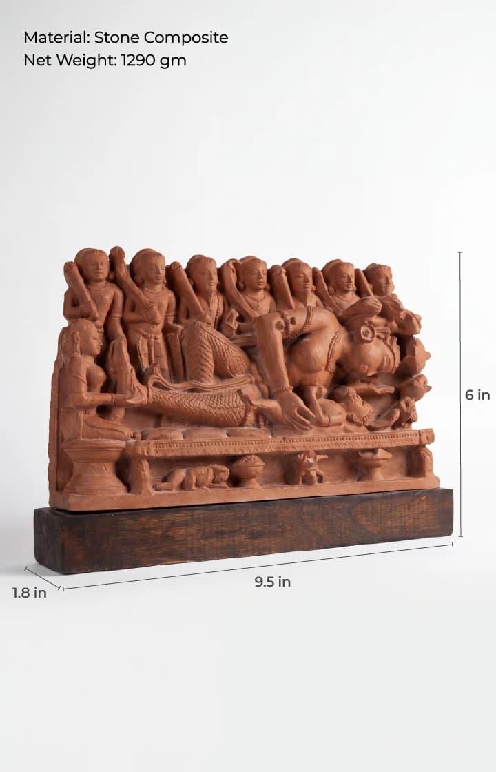 A stone composite replica of Krishna's Birth Sculpture showing Devaki and figures on a wooden base with dimensions.