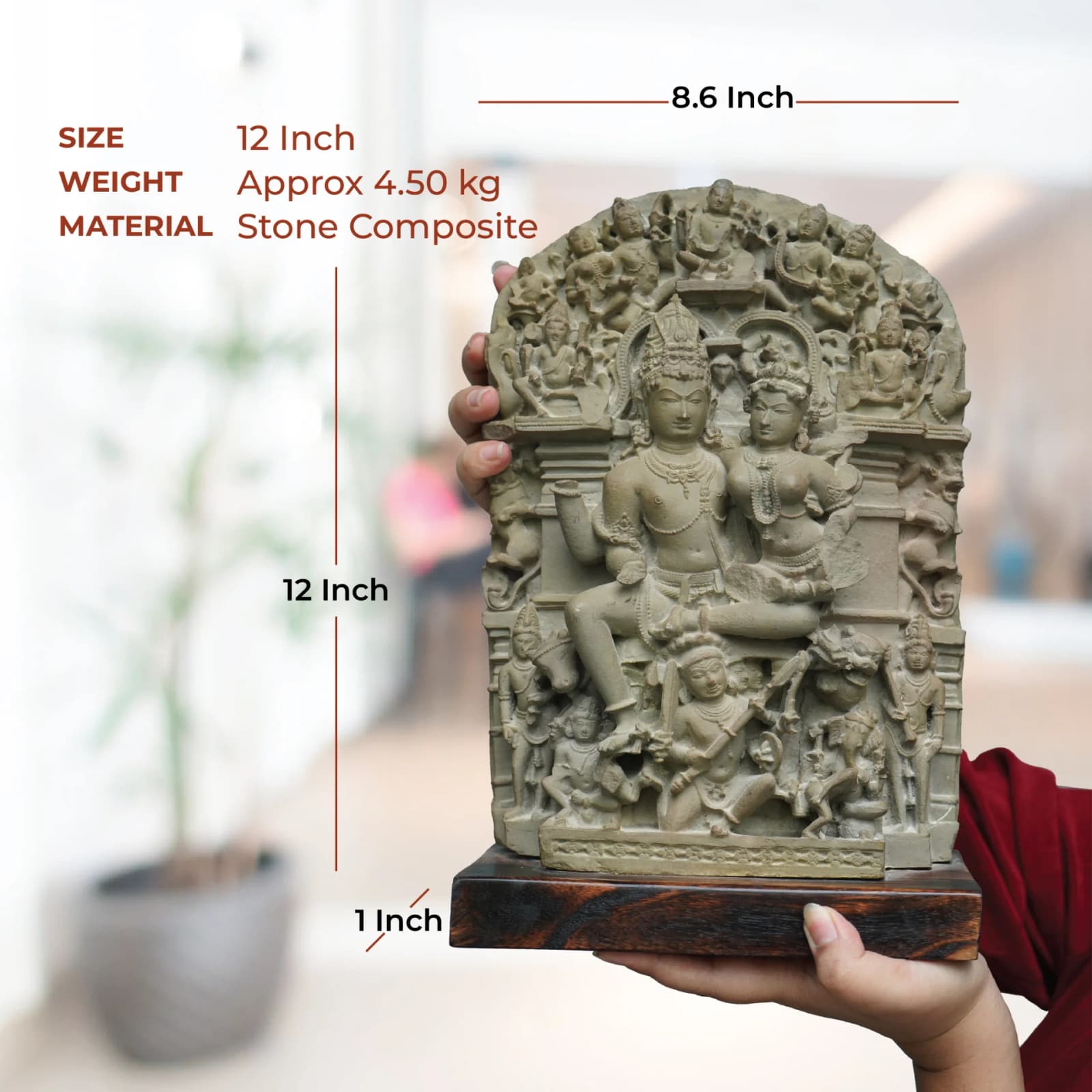 A person holds the Ravananugraha Sculpture, a stone composite replica, showing its scale against a blurred background with dimensions.