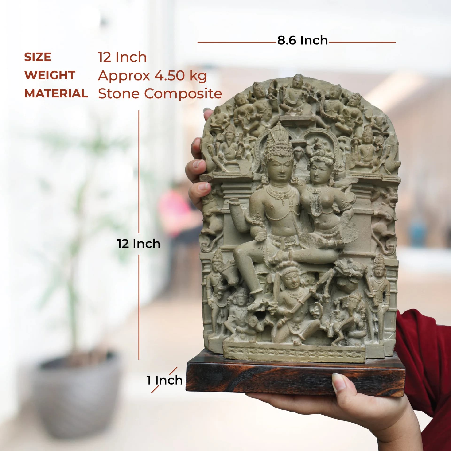 A person holds the Ravananugraha Sculpture, a stone composite replica, showing its scale against a blurred background with dimensions.