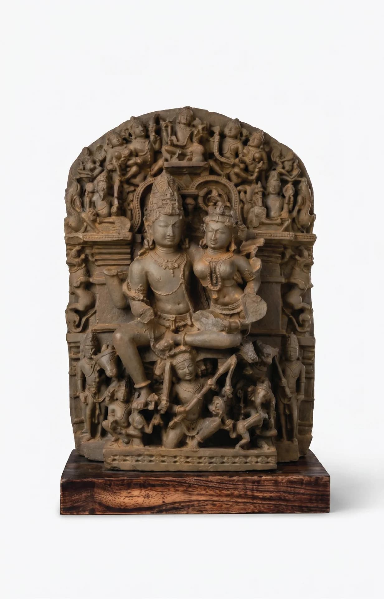 Full front view of the Ravananugraha Sculpture, a hand-finished stone composite replica featuring intricate divine figures on a teak base.