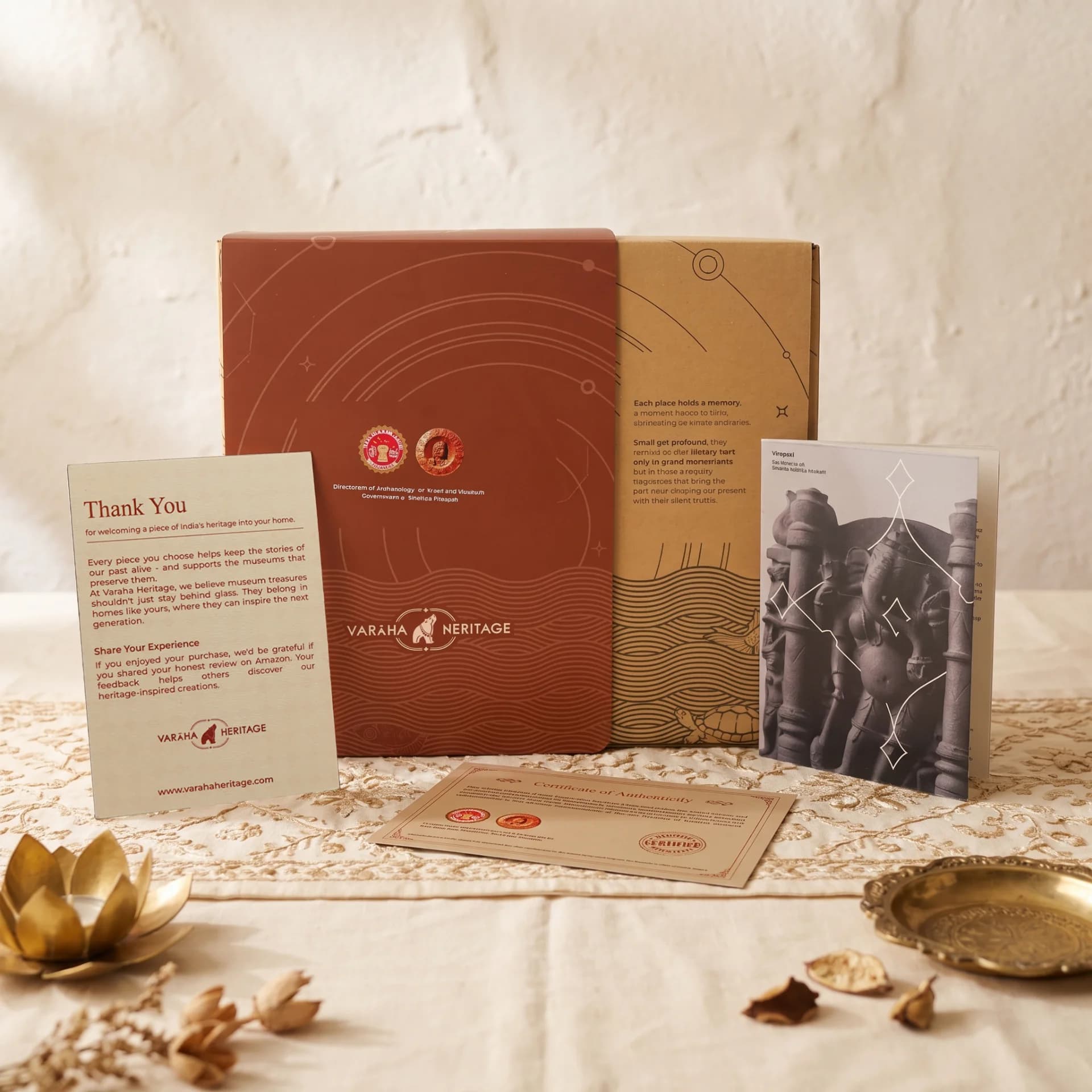 The Vinayaki Sculpture museum replica unboxing set includes a branded presentation box, a certificate of authenticity, and an informational booklet.