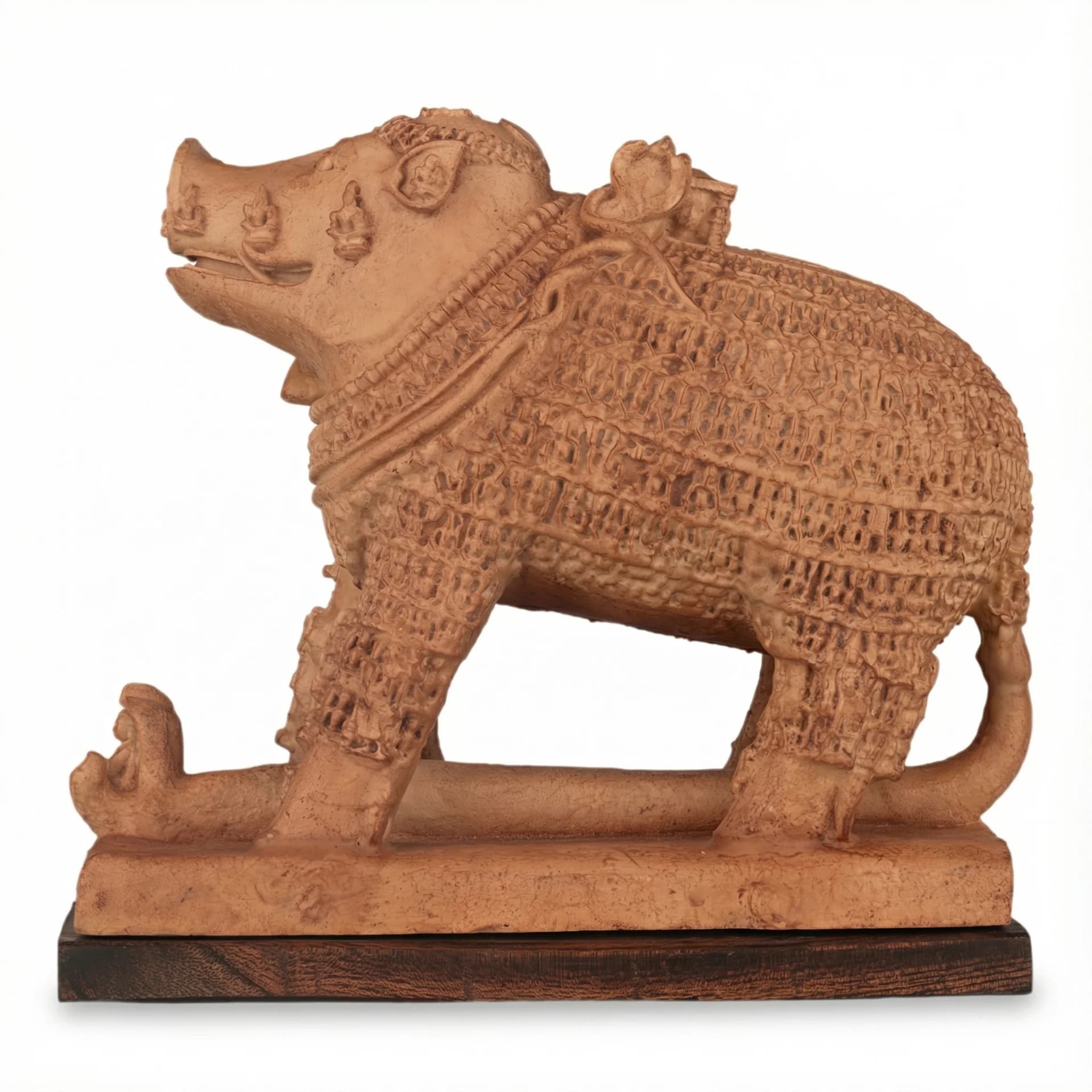 A side-profile view of the Adi Varaha Sculpture, featuring intricate sandstone-style carvings of the boar-headed deity on a wooden base.