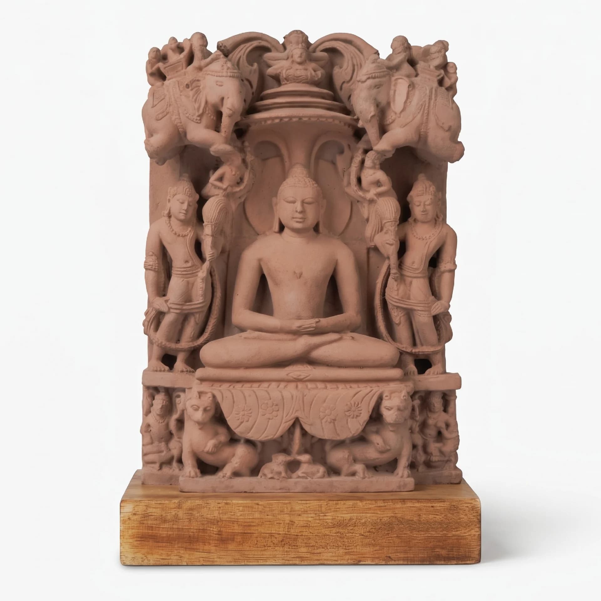 A stone composite Adinath Sculpture replica featuring a meditative Tirthankara figure seated in a traditional lotus posture.
