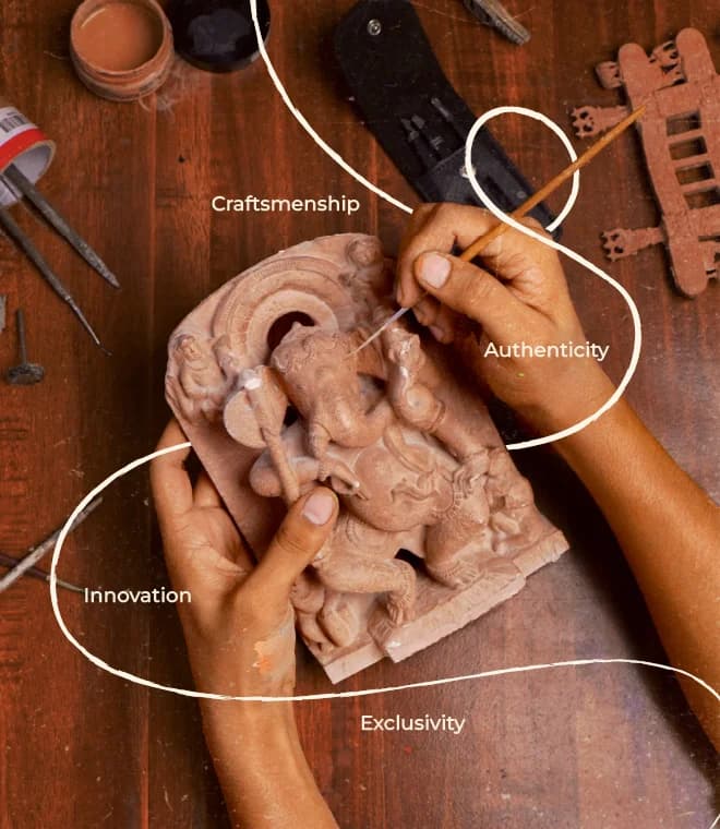 An artisan uses a fine tool to carve a sandstone Ganesha, Bringing stories from the heart of India with traditional craftsmanship.