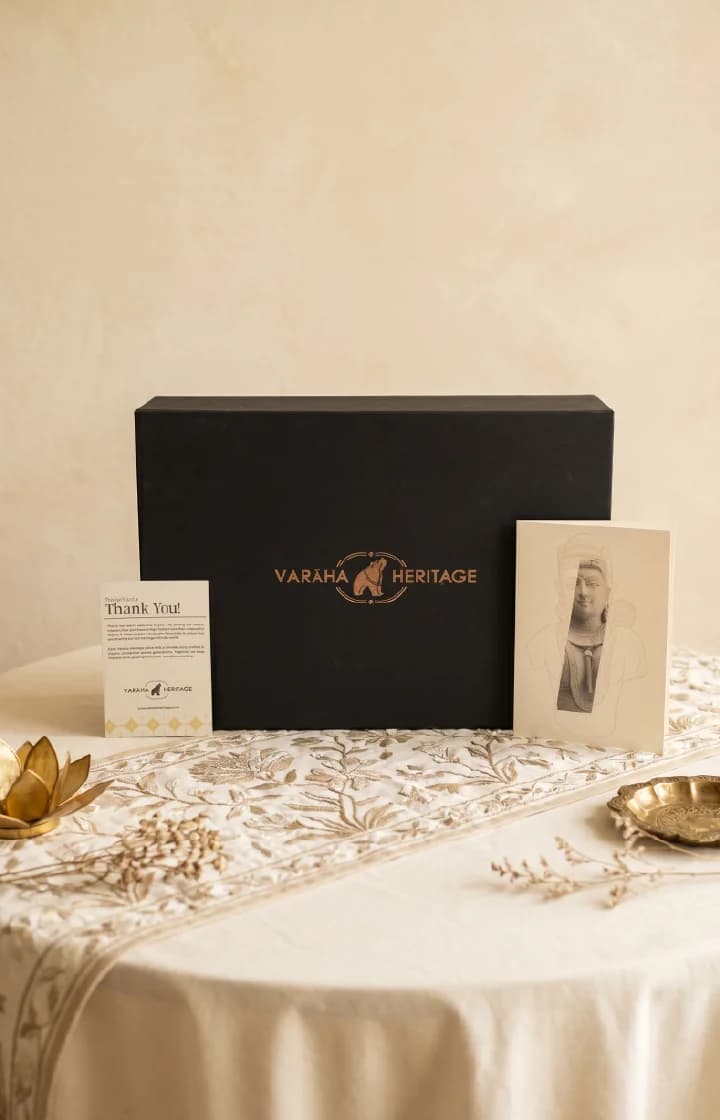 A black gift box featuring the Female Figure Bust Sculpture branding, accompanied by a thank you card and illustration.