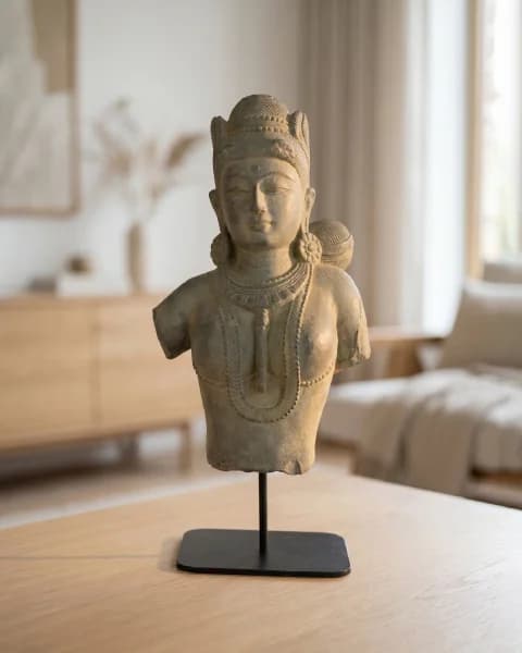 A front view of the Female Figure Bust Sculpture, a stone composite replica featuring elegant Chola-style jewelry and details.