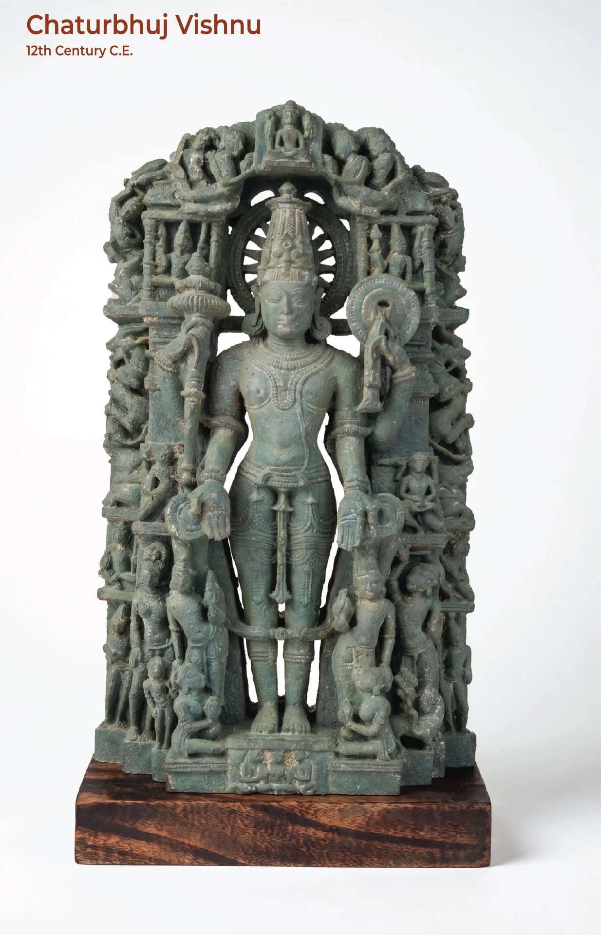 A full-front view of the Chaturbhuj Vishnu Sculpture, a stone composite replica featuring intricate carvings of deities.