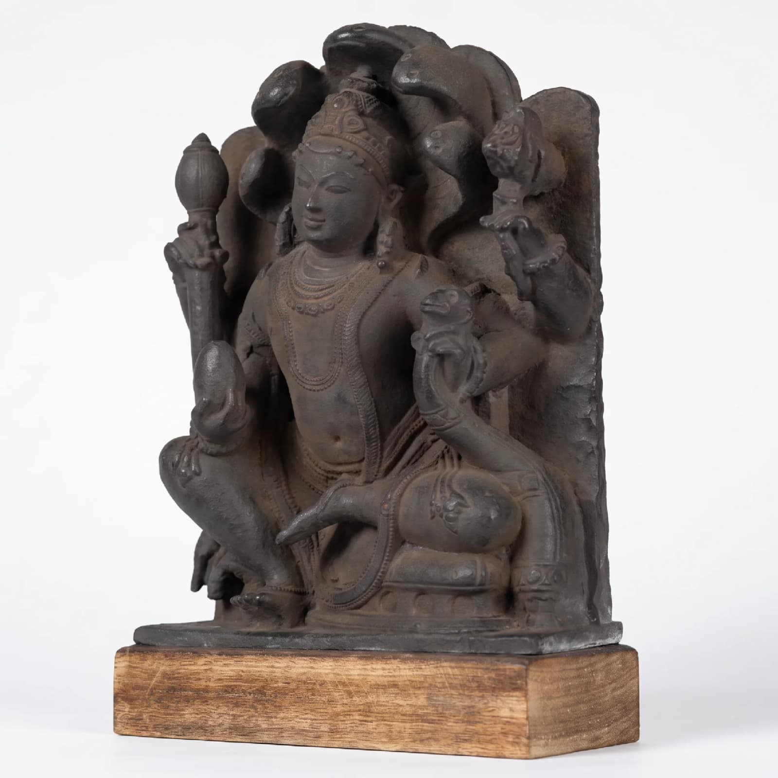 A three-quarter view of the Dhan Kuber Statue, a hand-finished stone composite replica featuring detailed traditional iconography.