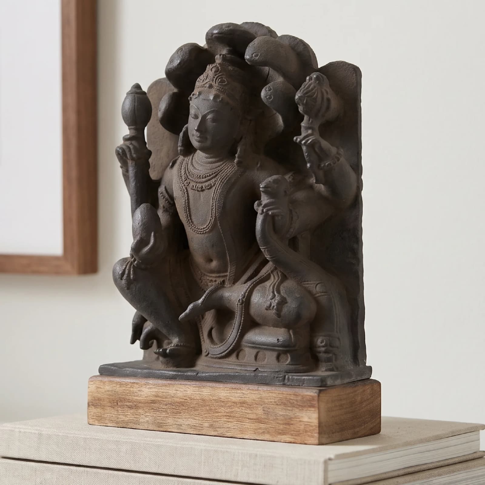 A three-quarter view of the Dhan Kuber Statue, a hand-finished stone composite replica featuring detailed carvings of the deity.