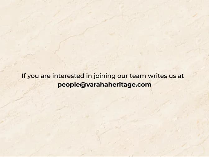 A cream-colored marble background featuring a recruitment message for the Varaha Heritage team with an email contact address.