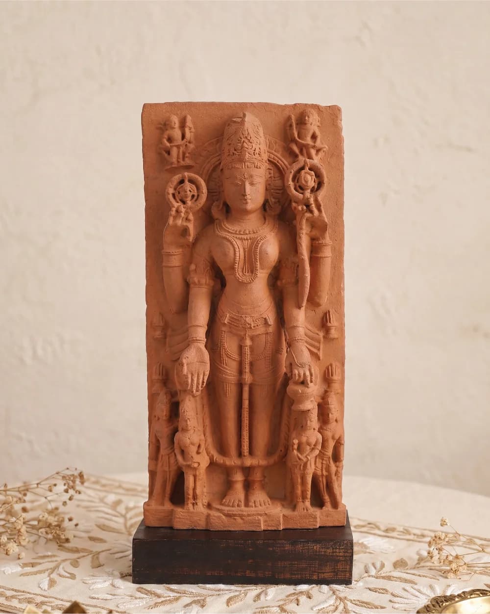 A front-facing view of the Gauri Parvati Sculpture, a stone composite museum replica showcasing intricate 10th-century Pratihara temple art details.