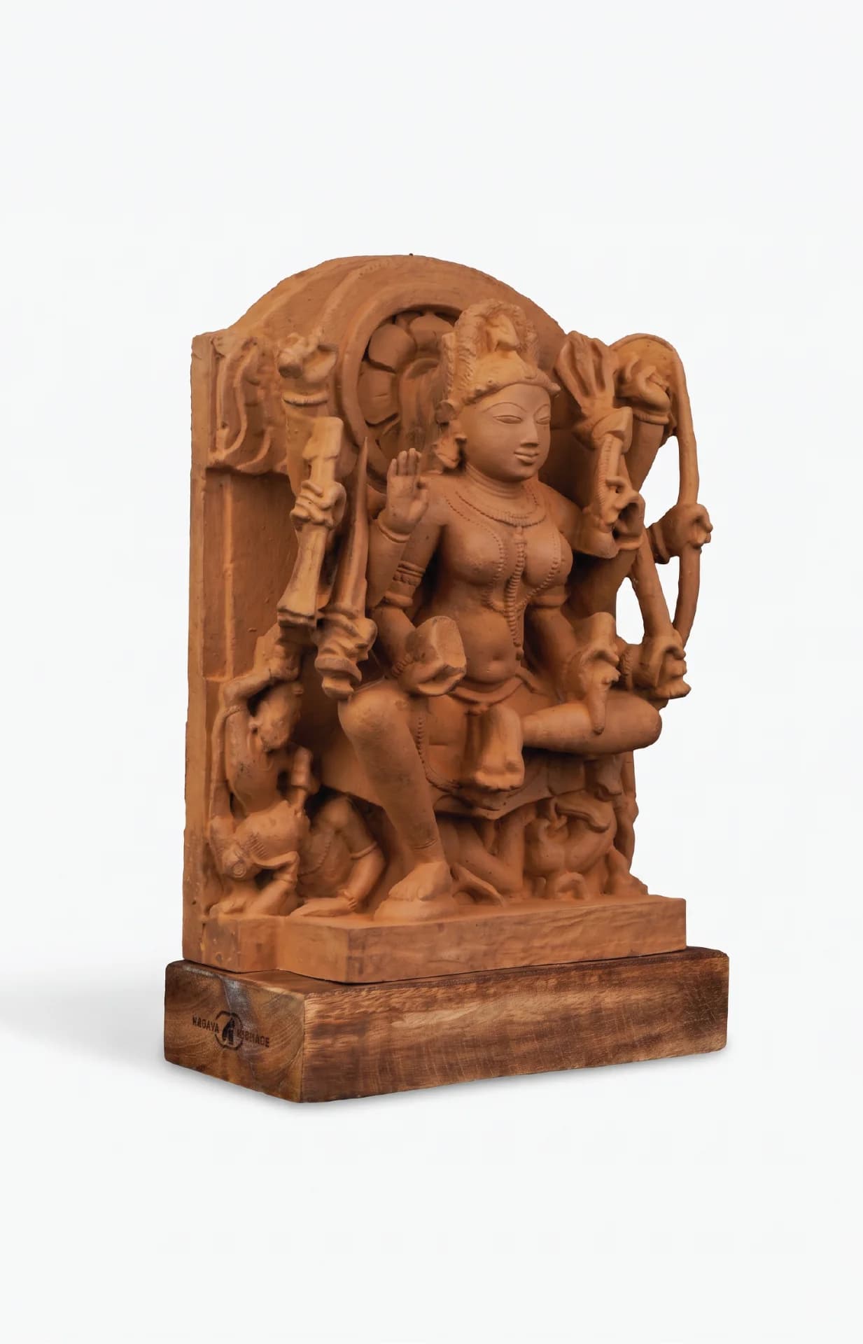 A three-quarter view of the Goddess Durga Sculpture, a hand-finished stone replica featuring intricate carvings of the deity.