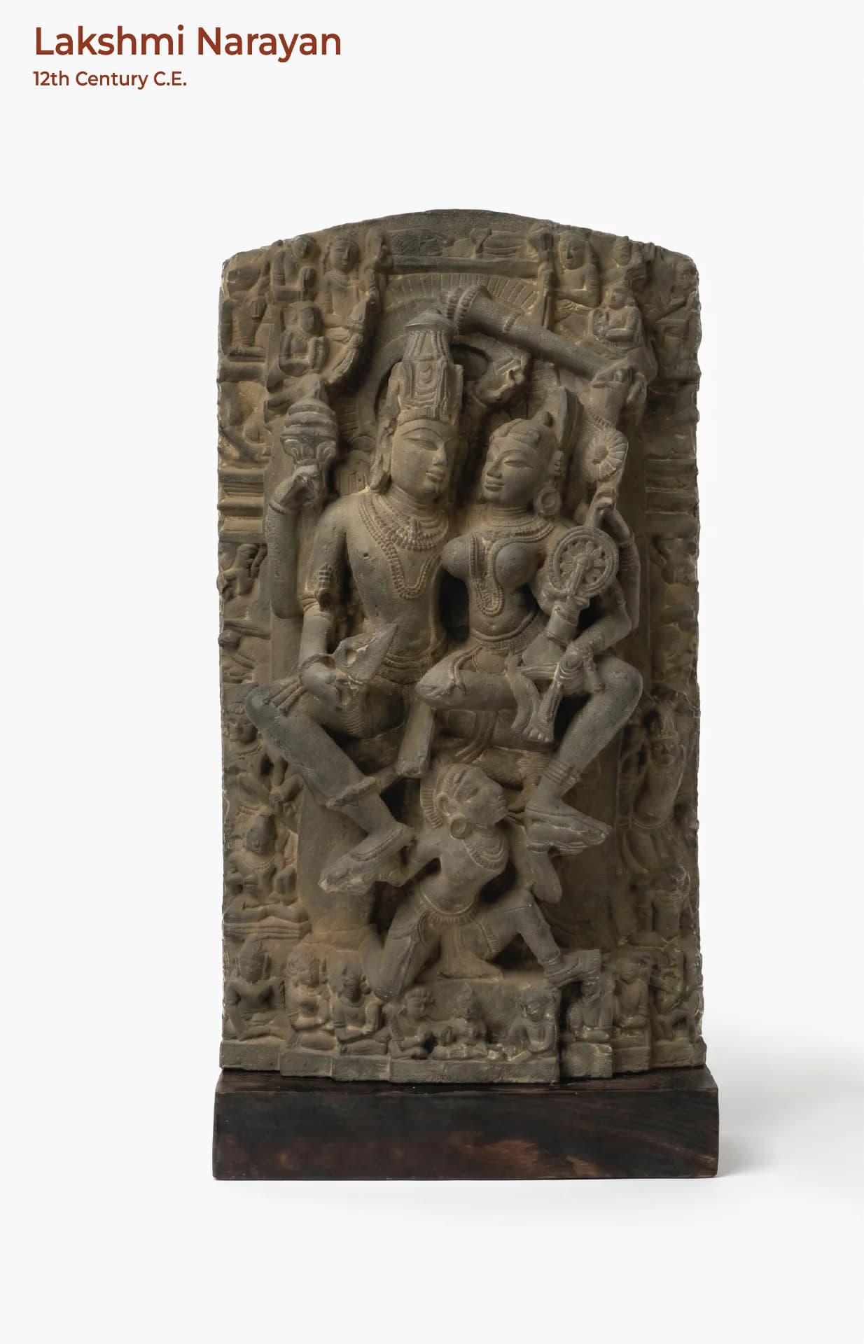 A full-front view of the Lakshmi Narayan Sculpture, a stone composite replica featuring intricate 12th-century medieval Indian iconography.
