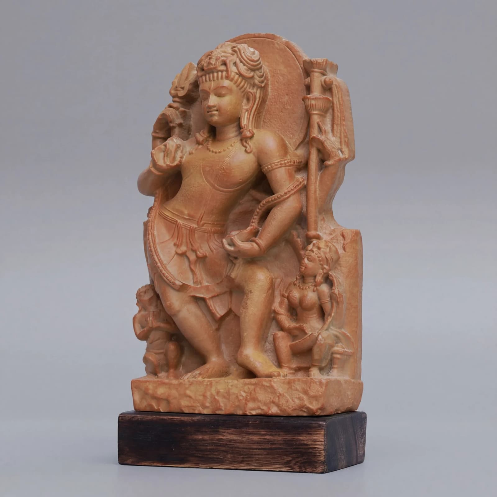 A three-quarter view of the Natesh Shiva Sculpture, a stone composite replica showing intricate dancing poses and traditional Pratihara craftsmanship.