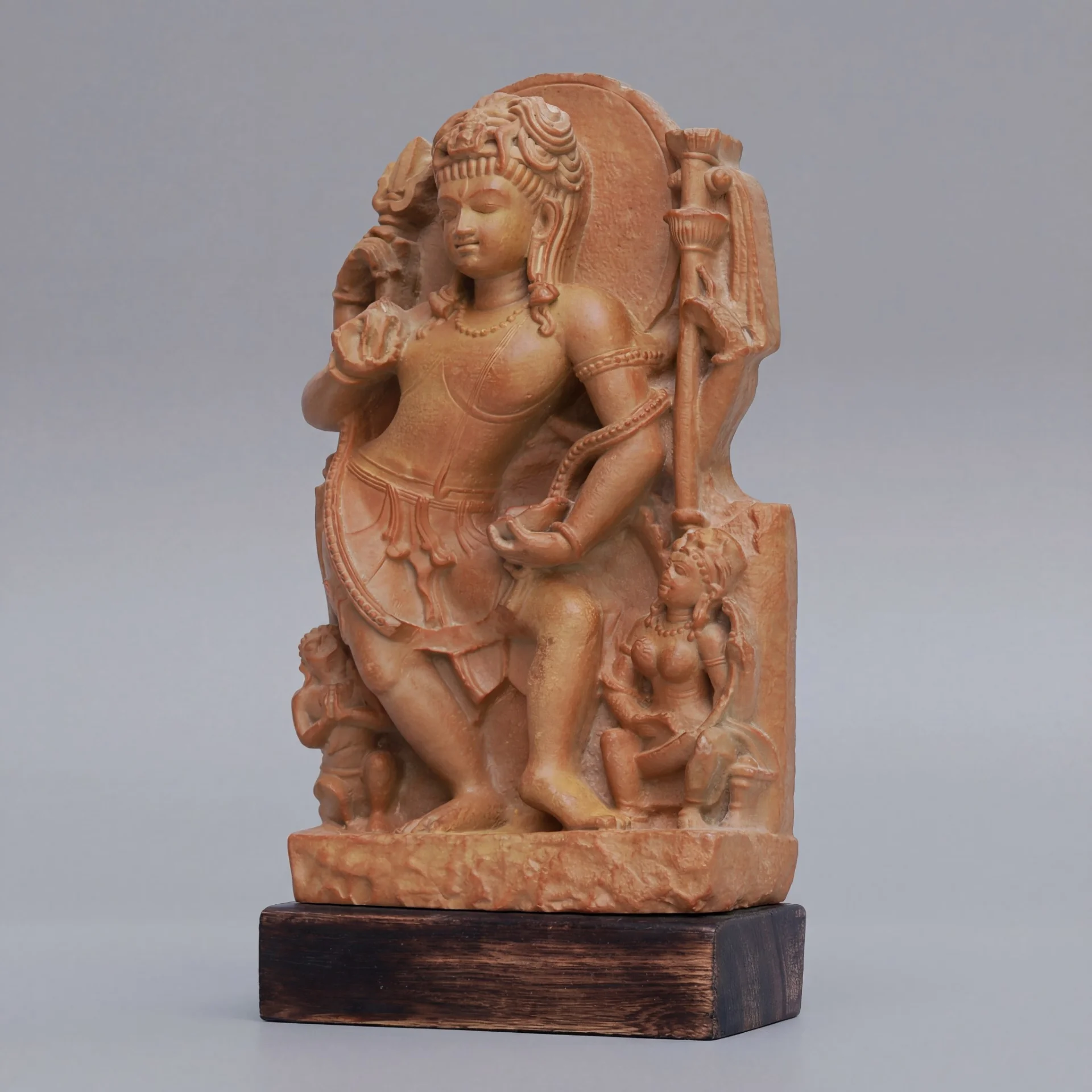 A three-quarter view of the Natesh Shiva Sculpture, a stone composite replica showing intricate dancing poses and traditional Pratihara craftsmanship.