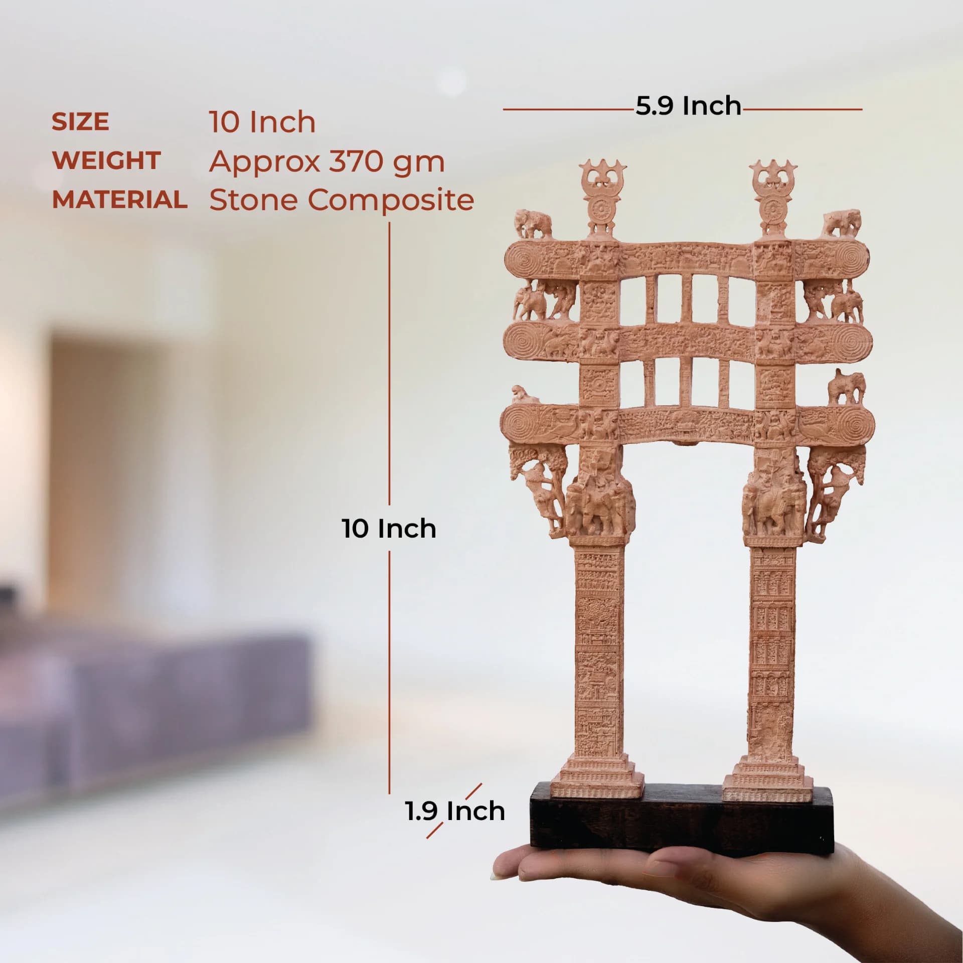 A hand holds a Sanchi Torana Gateway Miniature made of stone composite, with overlaid text indicating its physical dimensions.
