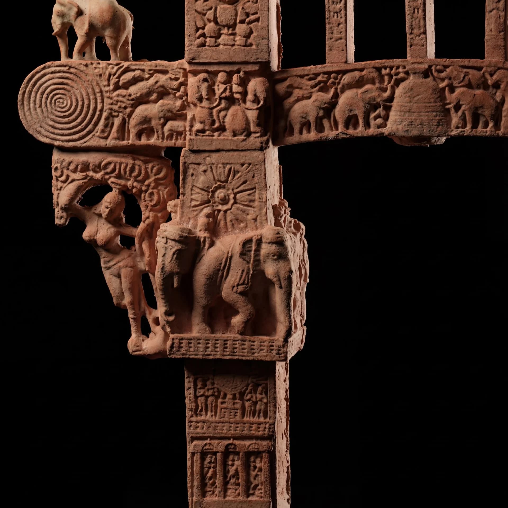 Close-up of the Sanchi Torana Gateway Miniature showing detailed stone composite carvings of elephants and ancient Buddhist motifs.