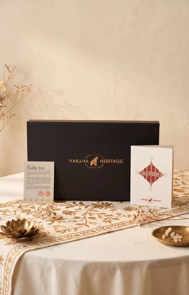 The Sanchi Torana Gateway Miniature arrives in a premium black gift box, accompanied by an informational card and greeting note.